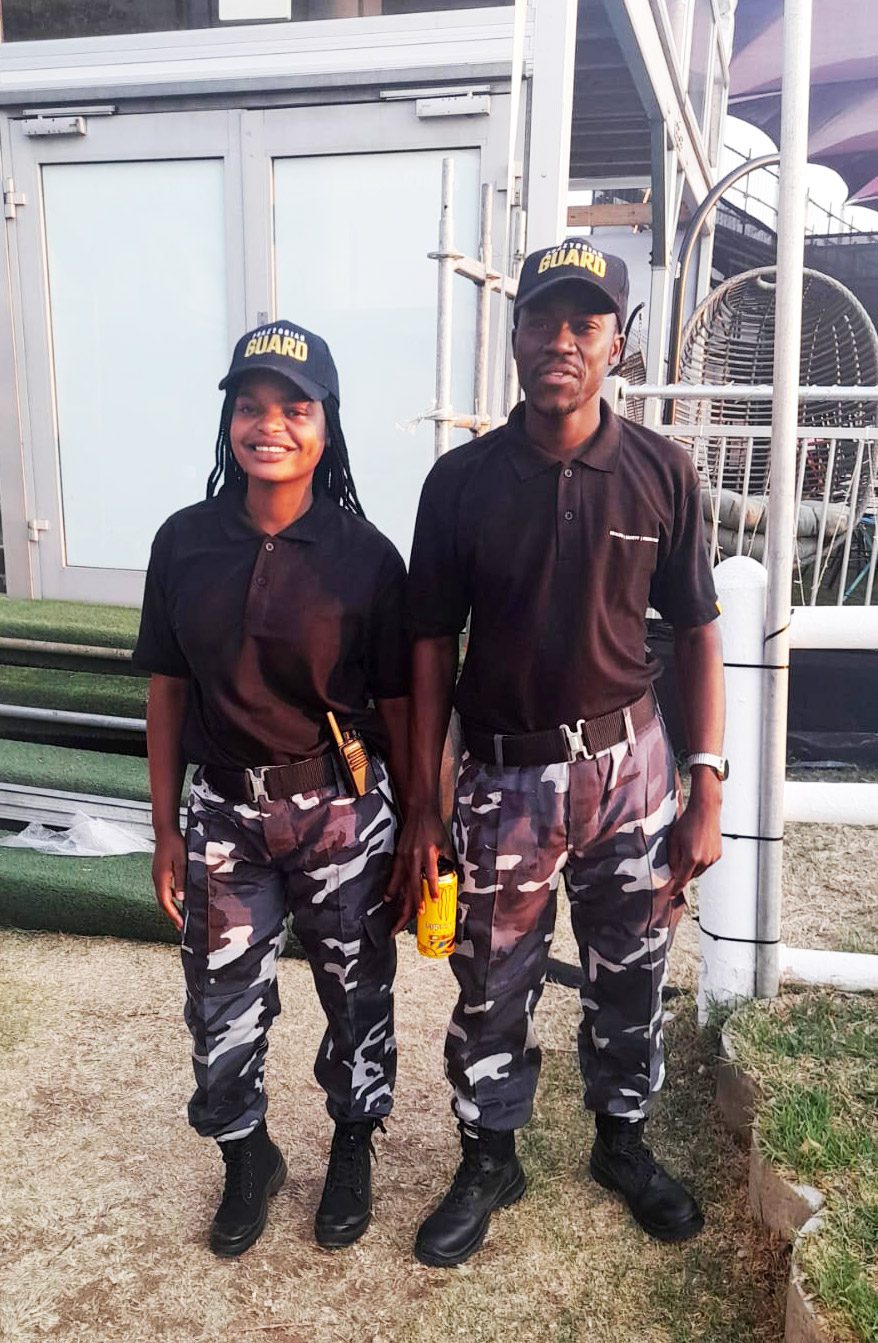 Two guards at the event entrance