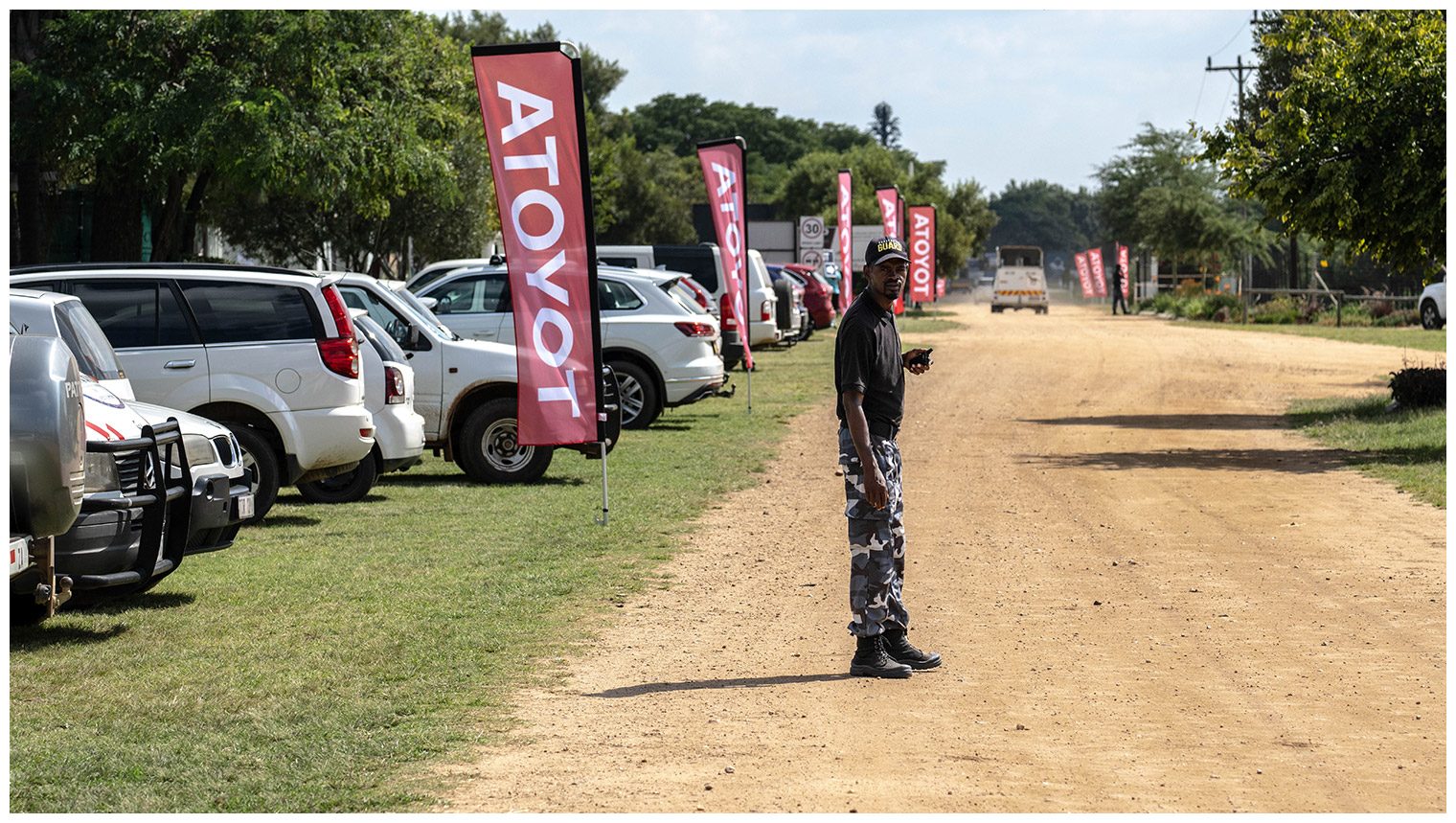 Guard directing traffic at an event